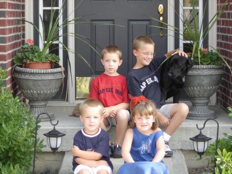The Kids and Maggie Sitting on the Front Steps