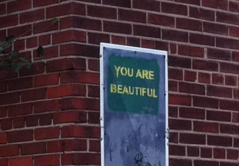 You Are Beautiful Poster on the Side of a Building