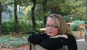 Katrina Anne Willis Sitting in a Chair